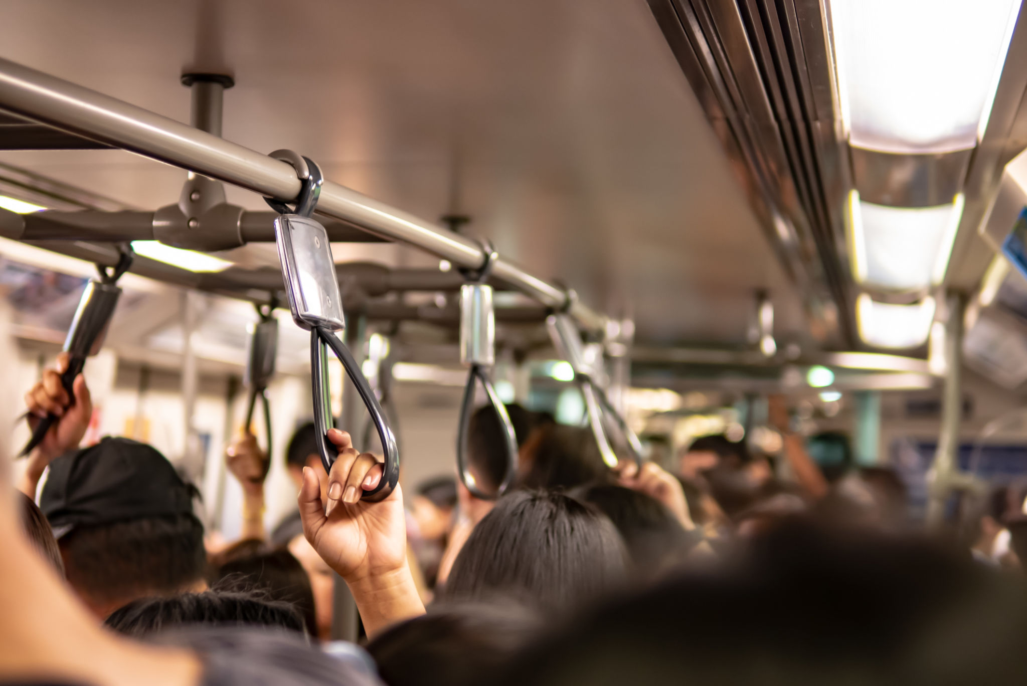 Crowd inside the train in rush hour Crowd inside the train in rush hour