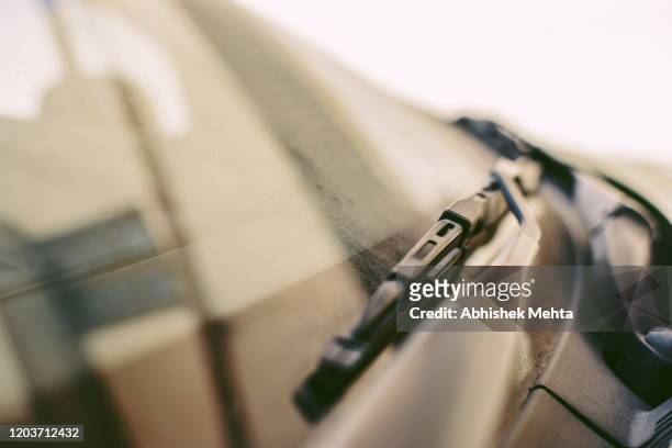car wiper close up - ruitenwisser stockfoto's en -beelden