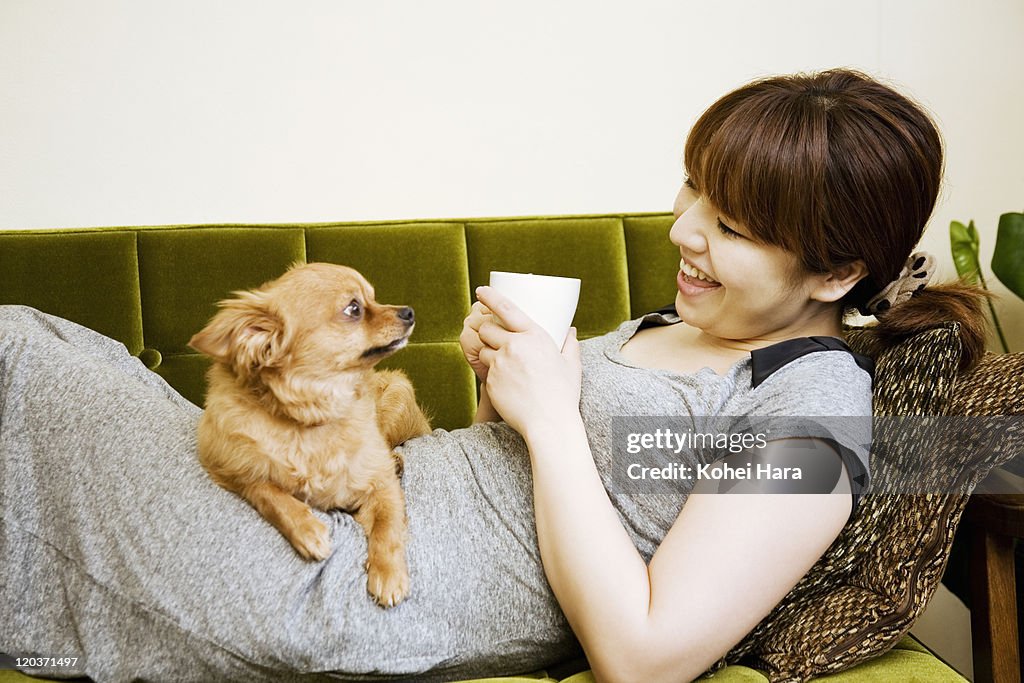 Woman and dog in the room