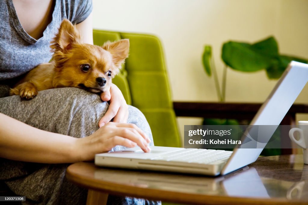 Woman and dog in the room