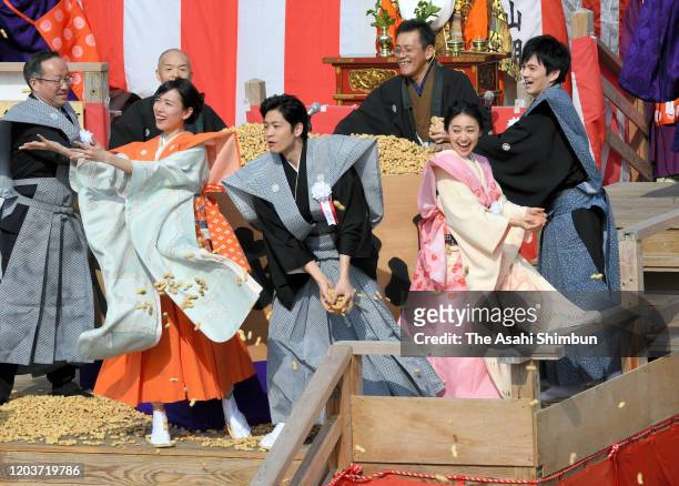 Actors Erika Toda, Kohei Matsushita, Yuko Oshima and Kento Hayashi attend the 'Mamemaki' bean scattering ceremony at Naritasan Fudoson Temple on...