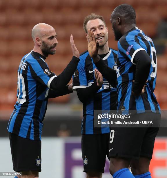 Romelu Lukaku of FC Internazionale celebrates his goal with his team-mates Christian Eriksen and Borja Valero during the UEFA Europa League round of...