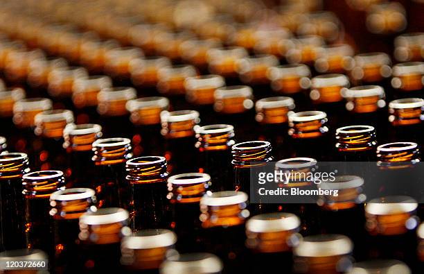 Beer bottles are seen here at the Owens-Illinois Glass Plant in Waco, Texas, U.S., on Thursday, Aug. 4, 2011. Owens-Illinois Inc., the world's...
