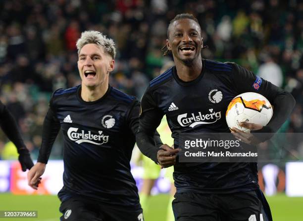 Dame N'Doye of FC Copenhagen celebrates after scoring his sides third goal during the UEFA Europa League round of 32 second leg match between Celtic...