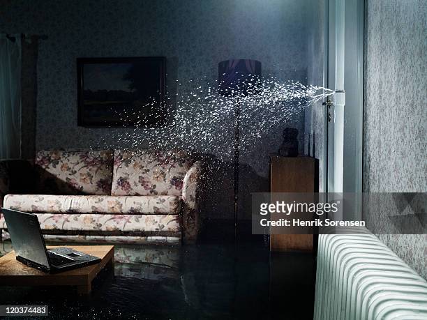 broken water pipe in flooded room - damaged stock pictures, royalty-free photos & images