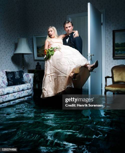 bride and groom entering flooded room - just married sign stock pictures, royalty-free photos & images