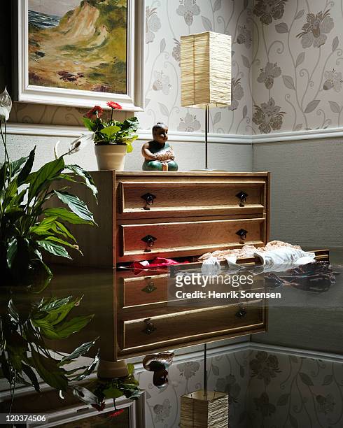 furniture in flooded room - house flood stock pictures, royalty-free photos & images