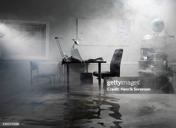 flooded office with smoke in the air - emergency department stock pictures, royalty-free photos & images