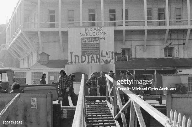 Sign reading 'Indians Welcome' to 'Indian Land' during the Occupation of Alcatraz protest on Alcatraz Island, San Francisco, December 1969. A group...