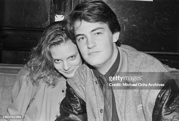 Actors Martha Plimpton and Matthew Perry at the Limelight in New York City, circa 1988.