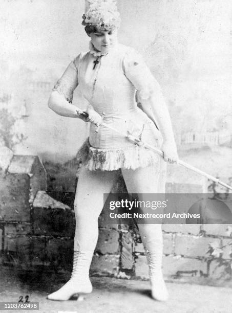 Souvenir Cabinet Card portrait of American stage actress Irene Verona, by Newsboy Images, depicting the actress is dressed in a male period costume...