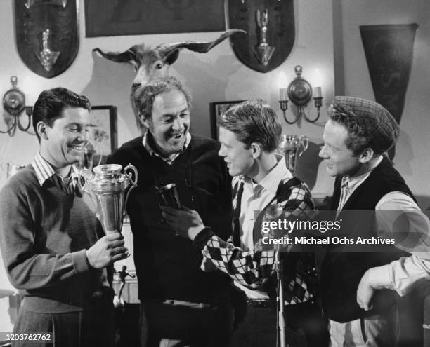 From left to right, American actors Anson Williams, Jerry Paris, Ron Howard and Donny Most in a scene from the television sitcom 'Happy Days', circa...