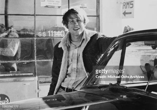 American actor and director Ron Howard as Sam Freeman in the New World Pictures film 'Grand Theft Auto', 1977. The movie is his feature film...