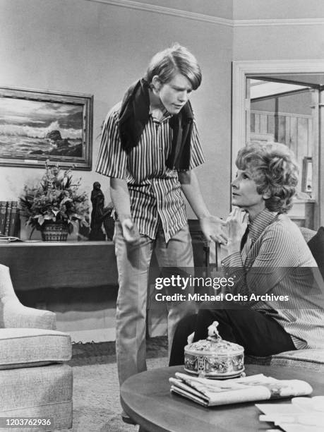 American actors Ron Howard and Marion Ross in a scene from the television sitcom 'Happy Days', USA, 1974.