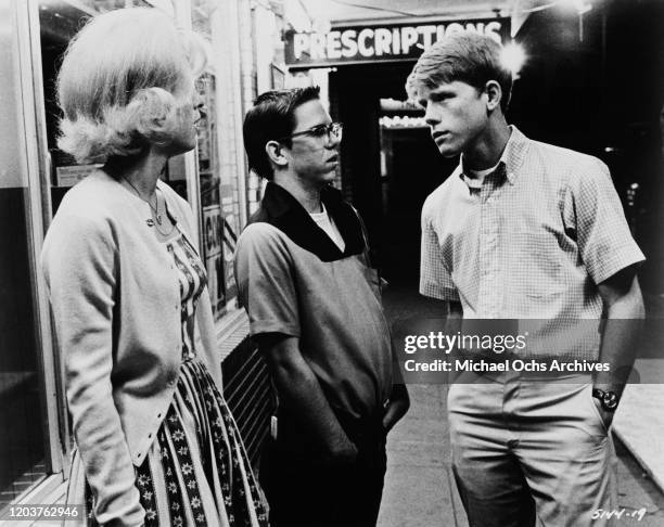 From left to right, actors Candy Clark, Charles Martin Smith and Ron Howard in a scene from the Lucasfilm production 'American Graffiti', 1973....