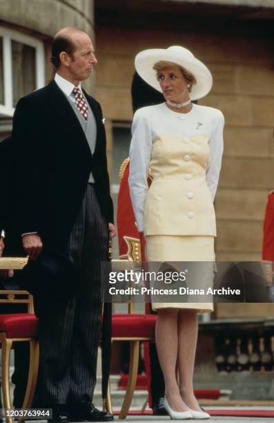 Diana, Princess of Wales with the Duke of Kent during the Presentation of the Colours to the guards at Buckingham Palace, London, May 1990. Diana is...