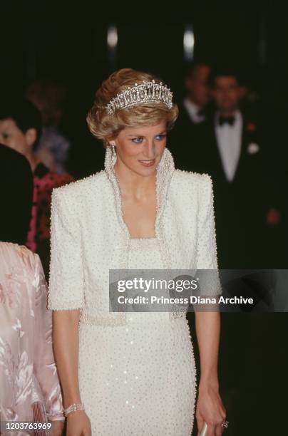 Diana, Princess of Wales attends the gala opening of a cultural centre in Hong Kong, November 1989. She is wearing a white beaded evening gown by...