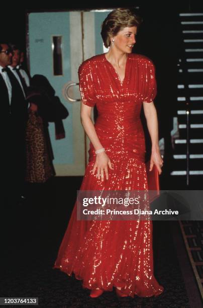 Diana, Princess of Wales at the premiere of the film 'When Harry Met Sally' in London, November 1989. She is wearing a red evening gown by Bruce...