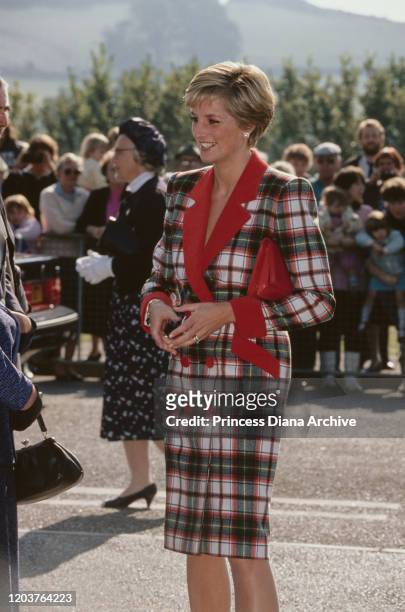 Diana, Princess of Wales visits Cullompton in Devon, September 1990. She is wearing a tartan coat-dress by Catherine Walker.