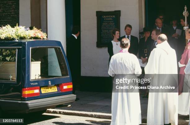Diana, Princess of Wales attends the funeral of her friend Adrian Ward-Jackson at Grosvenor Chapel in Mayfair, London, 29th August 1991. To the left...
