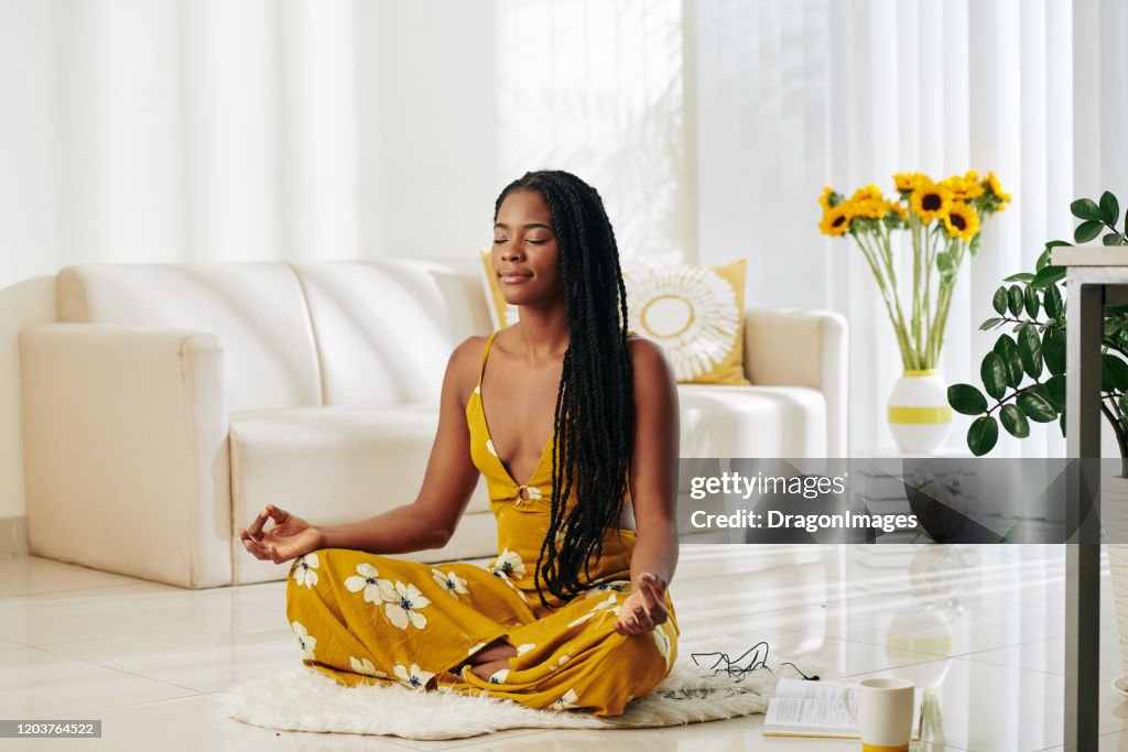 Meditating youn woman