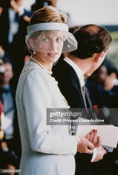 Prince Charles and Diana, Princess of Wales attend the enthronement of Emperor Akihito in Tokyo, Japan, 12th November 1990. Diana is wearing a dress...