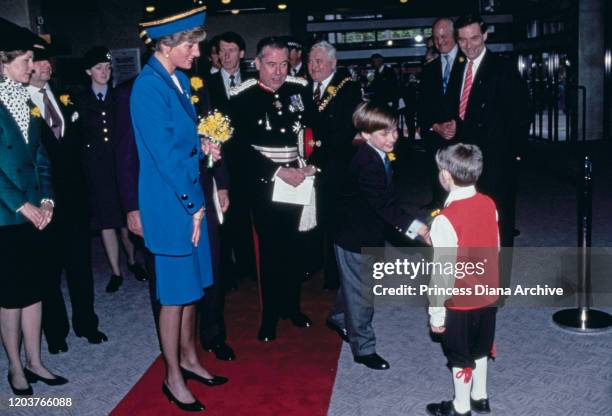 Diana, Princess of Wales accompanies her son Prince William on his first official engagement in Cardiff, Wales, 1st January 1991.