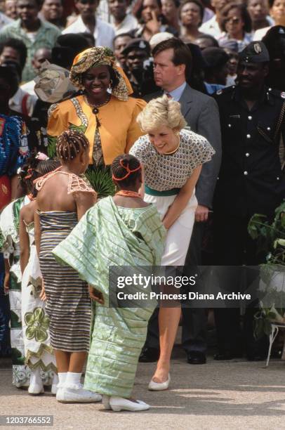 Diana, Princess of Wales attends a Better Life For Rural Dwellers women's fair in Tafawa Balewa Square, Lagos, Nigeria, accompanied by Maryam...