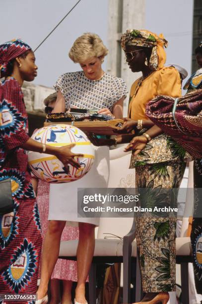 Diana, Princess of Wales attends a Better Life For Rural Dwellers women's fair in Tafawa Balewa Square, Lagos, Nigeria, accompanied by Maryam...