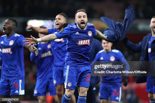 Mathieu Valbuena of Olympiacos celebrates going through to the next round during the UEFA Europa League round of 32 second leg match between Arsenal...