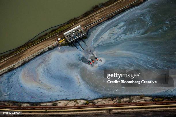 aerial view of oil sands operations - oil sands stock pictures, royalty-free photos & images