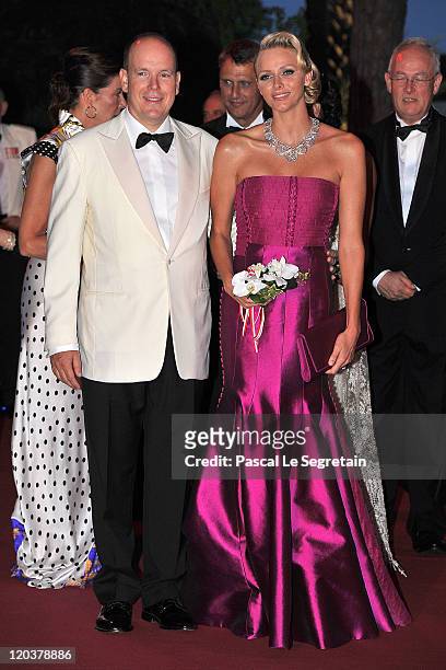 Prince Albert II of Monaco and Princess Charlene of Monaco attend the 63rd Red Cross Ball at the Sporting Monte-Carlo on August 5, 2011 in...