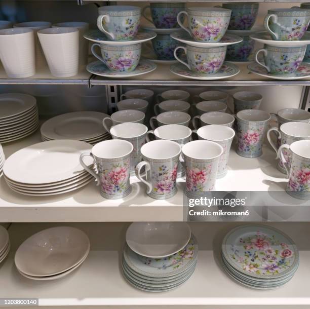 crockery, porcelain, utensils and other different stuff on shop - porcelana china stock pictures, royalty-free photos & images