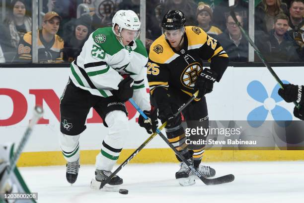 Esa Lindell of the Dallas Stars skates against Brandon Carlo of the Boston Bruins at the TD Garden on February 27, 2020 in Boston, Massachusetts.