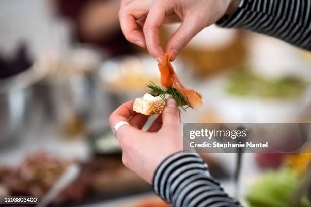 mini smoked salmon bagle - smoked salmon stock pictures, royalty-free photos & images