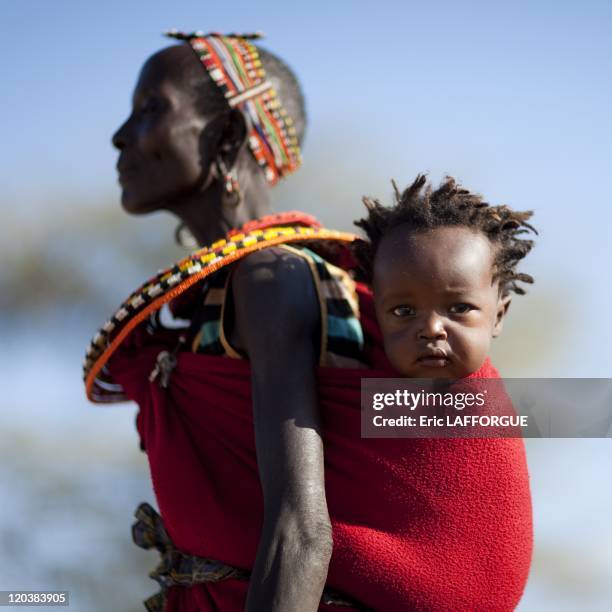 Samburu mother and child in Kenya on July 13, 2009 - The Samburu are closely related to the Maasai. Like the Maasai, they live in the central Rift...