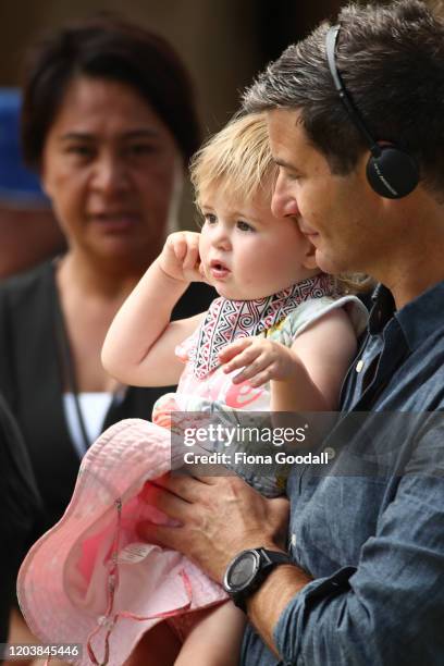 Neve Te Aroha Arden Gayford, with her dad Clarke Gayford, listens to her mother Prime Minister Jacinda Ardern speak at the upper Treaty grounds Te...