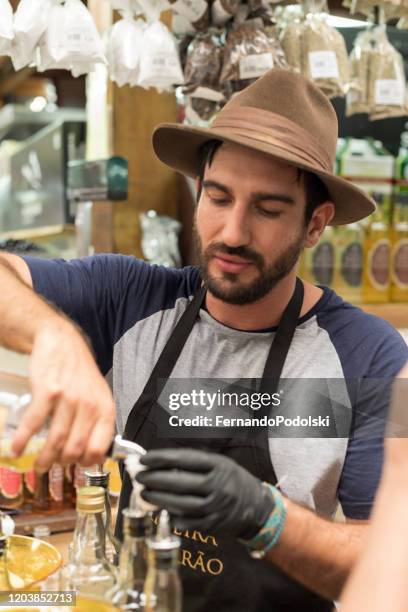 cachaça vendor - cachaça stock pictures, royalty-free photos & images