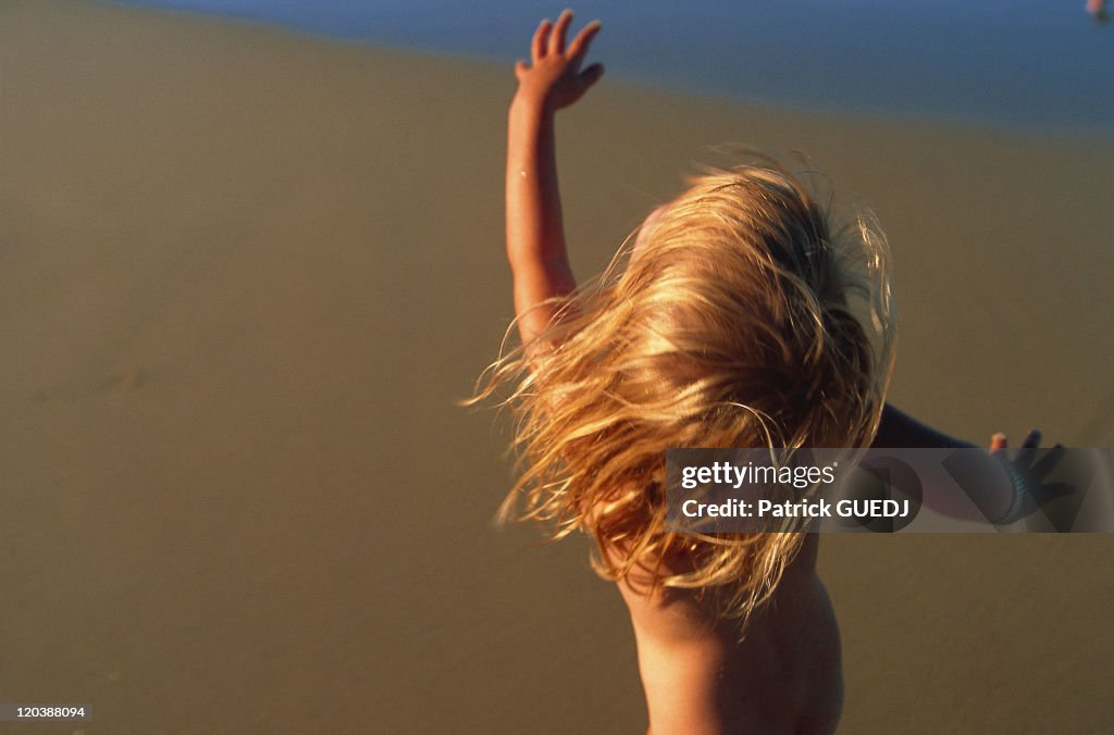Child On The Beach In Australia -