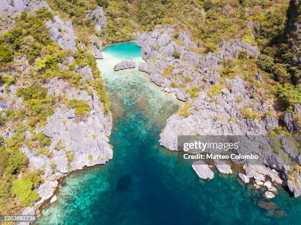 aerial view of cove, el nido, palawan, philippines - el nido stock pictures, royalty-free photos & images