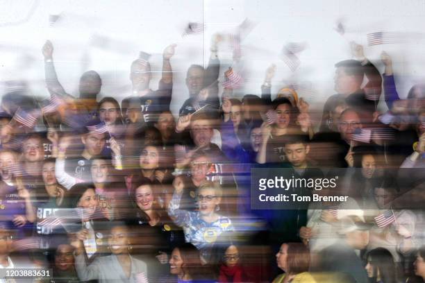 Supporters of democratic presidential candidate Pete Buttigieg cheer at his caucus night watch party on February 03, 2020 in Des Moines, Iowa. Iowa...