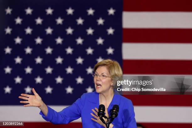 Democratic presidential candidate Sen. Elizabeth Warren addresses her supporters during a caucus night rally at the Forte Banquet and Conference...