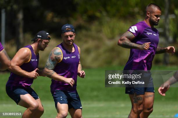 Cameron Munster of the Storm warms up during a Melbourne Storm NRL media opportunity & training session at Gosch's Paddock on February 04, 2020 in...