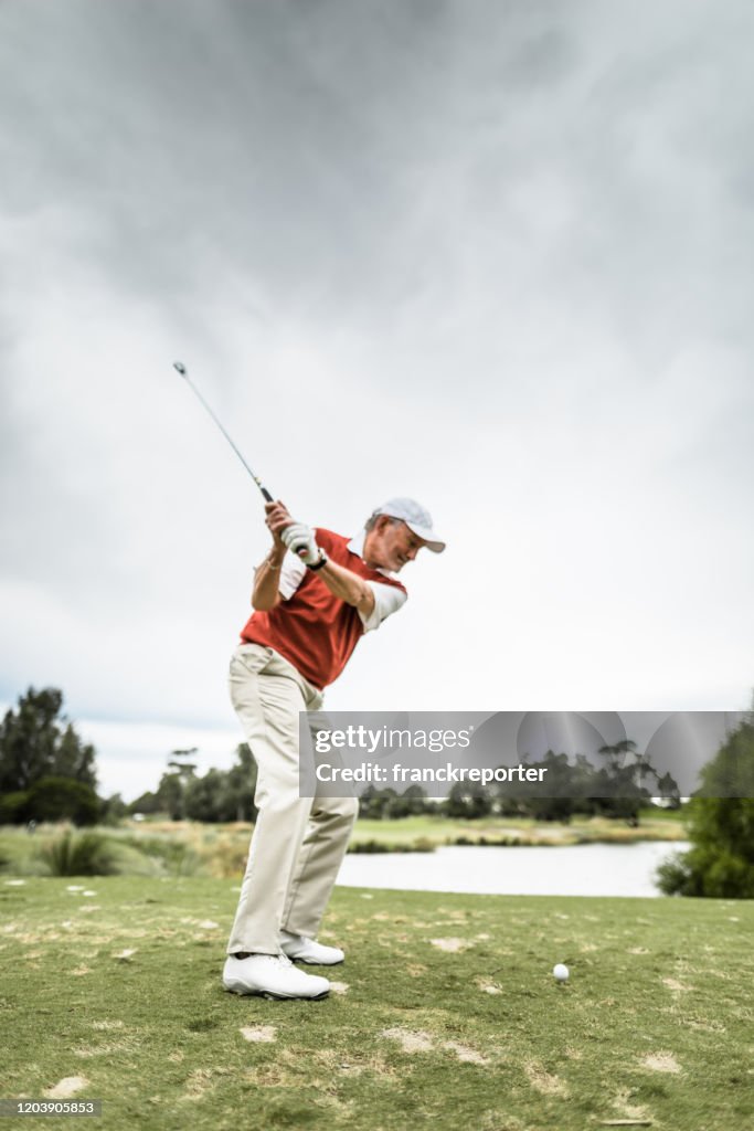 Mature adult golf player