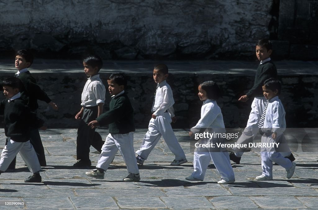 Pupils In Row In The Courtyard Of The School, Bharmour, Himachal Pradesh, North India -