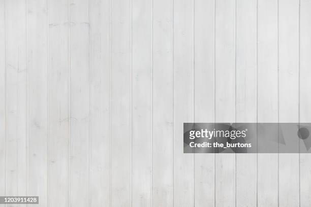 full frame shot of gray painted wooden wall - holzwand stock-fotos und bilder