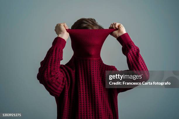 self consciousness - turtleneck stock pictures, royalty-free photos & images