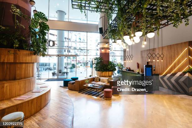 interior of modern office building during the day - lobby stock pictures, royalty-free photos & images
