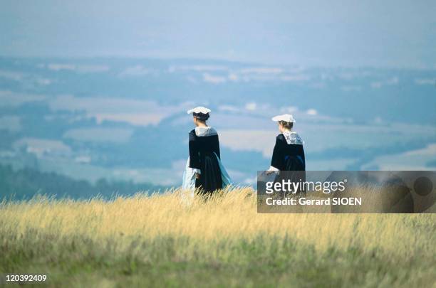 Typical Brittany in France - Finistere, Saint Pierre Quiberon, Menez.Hom, folkloric manifestation at top, Breton women in traditional costumes.