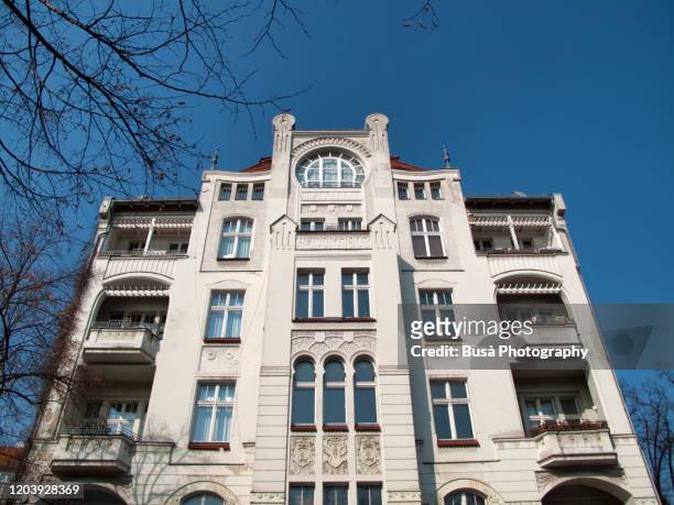 facades of art nouveau residential buildings in the district of neukoelln, berlin, germany - berlin modernism housing estates stock pictures, royalty-free photos & images